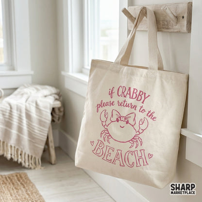 Whimsical pink crab graphic with a bow and funny coastal quote, ideal for creating trendy summer vacation t-shirts, DTF transfers, and printable gifts.
