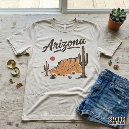 Vintage style Arizona desert graphic featuring a mesa, cacti, and sun, perfect for western-themed t-shirt printing and DIY craft projects.