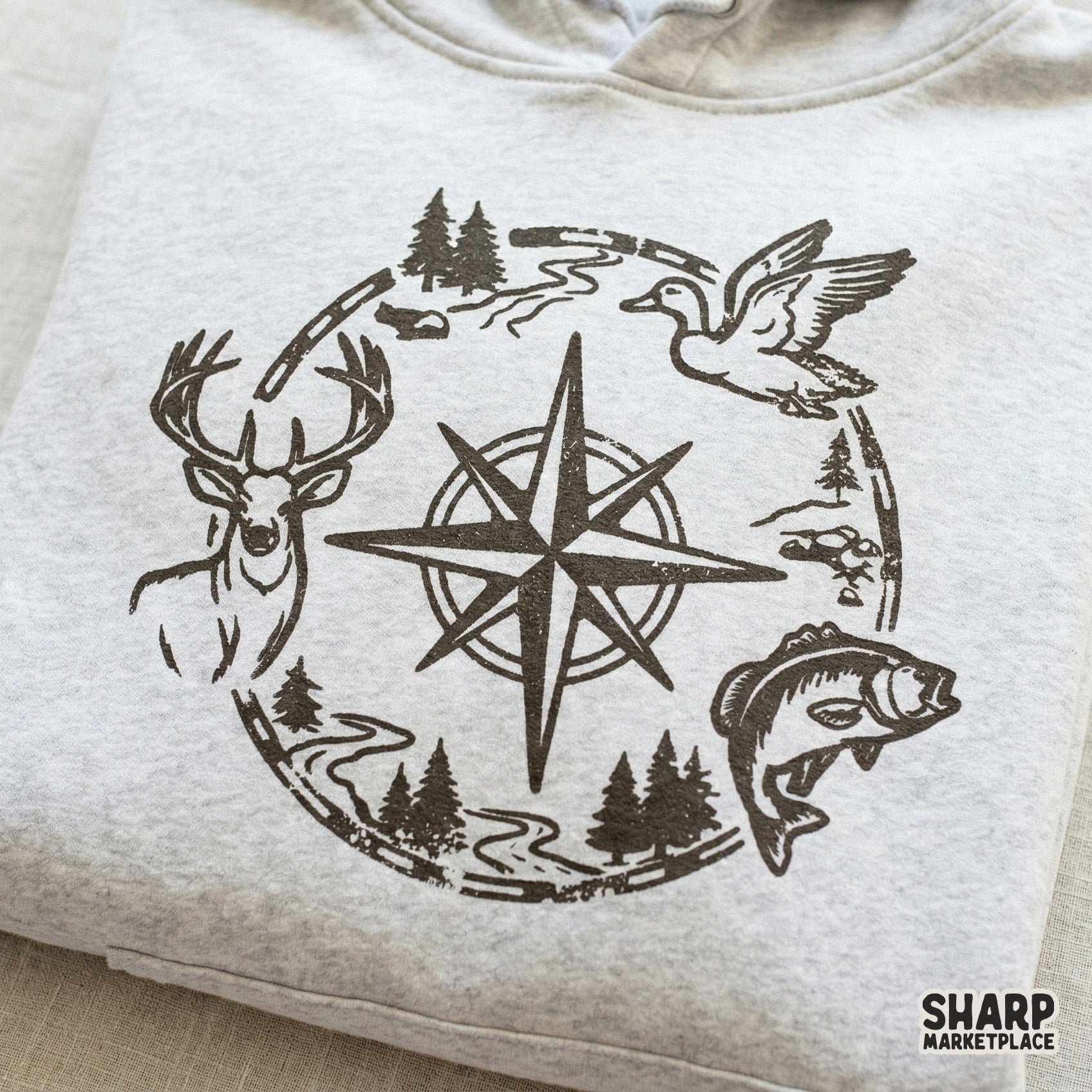 Circular wilderness compass illustration with outdoor motifs, ideal for custom hunting shirts, camping tumblers, and DIY outdoor-themed crafts.
