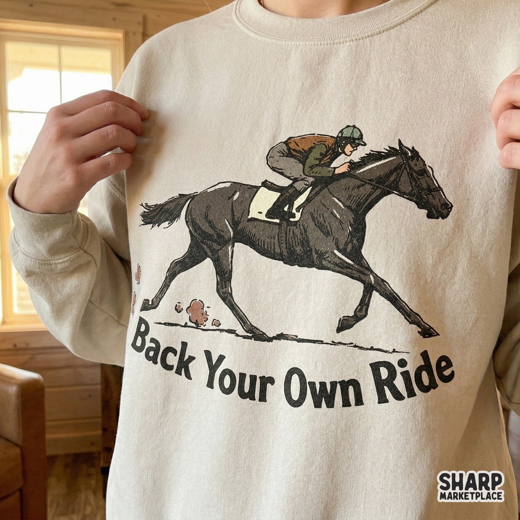 Retro horse racing graphic with a jockey in mid-stride on a dark horse and the motivational quote Back Your Own Ride for custom t-shirt printing.