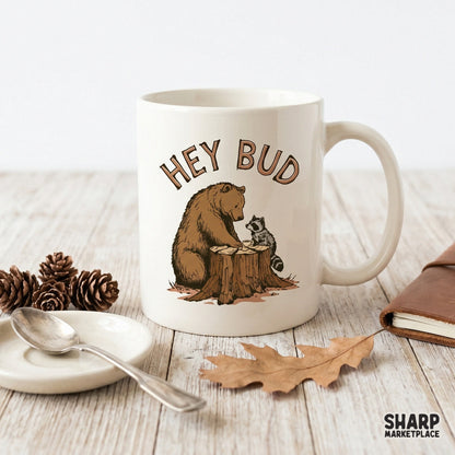 Digital sublimation design featuring a whimsical bear and raccoon coffee meme with muted earth tones, perfect for custom t-shirts and woodland-themed decor.