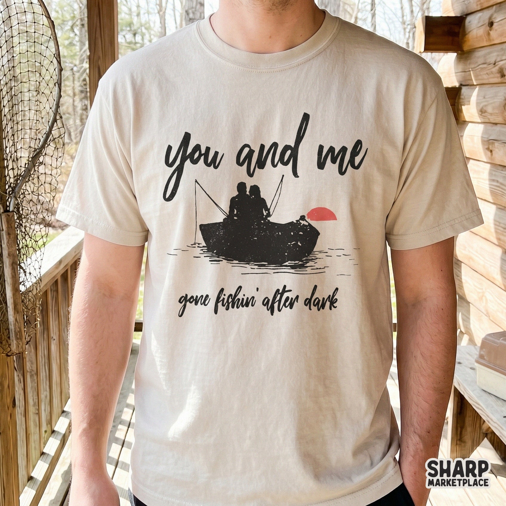 Digital sublimation design with a silhouette of a couple in a boat on a lake, featuring rustic script text for custom apparel and DIY fishing gifts.