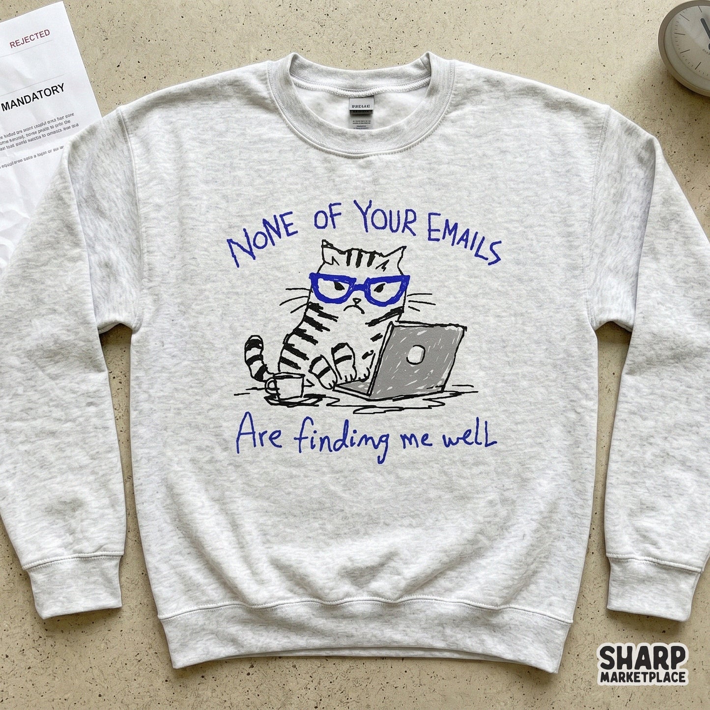Expressive line art of a tabby cat working on a laptop with blue glasses, suitable for print-on-demand projects like tumblers, shirts, and wall art.