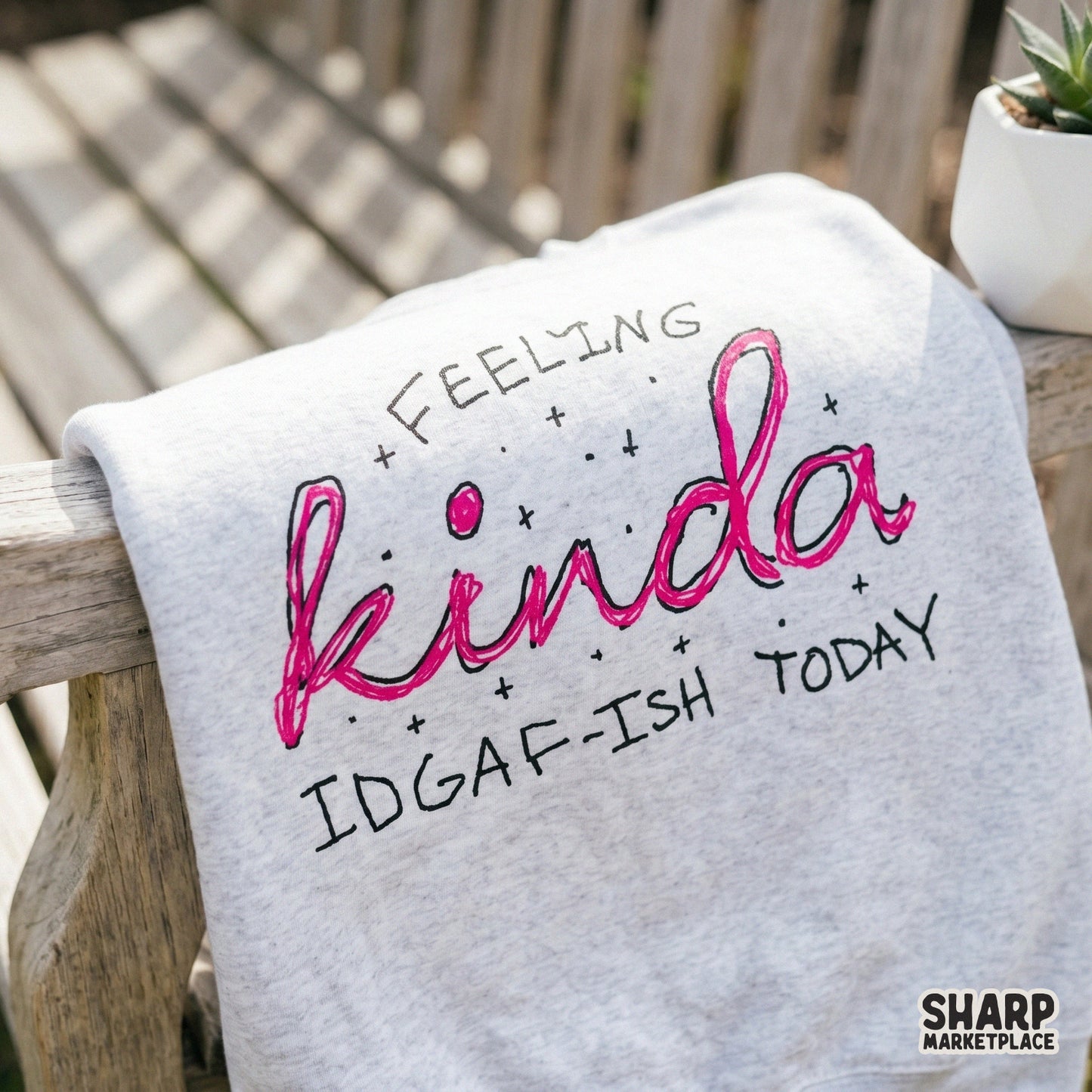 Hand-drawn style digital design with Feeling Kinda IDGAF-Ish Today in pink script, suitable for sublimation, tumblers, and quirky wall art.