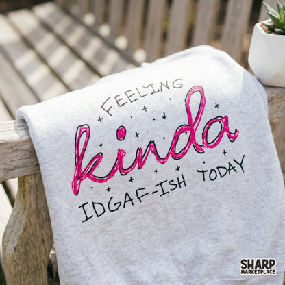 Hand-drawn style digital design with Feeling Kinda IDGAF-Ish Today in pink script, suitable for sublimation, tumblers, and quirky wall art.