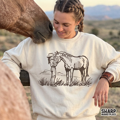 Vintage sketch cowgirl petting a horse in desert landscape western png sublimation design for shirts and apparel
