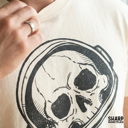 Edgy space-themed skull illustration with hand-drawn textures, suitable for custom t-shirt designs, posters, or spooky DIY craft projects.