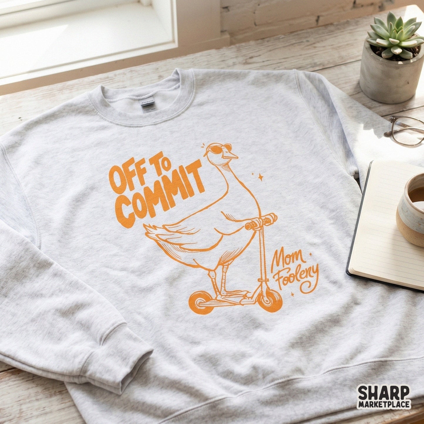 Whimsical goose riding a scooter graphic with bold distressed text reading Off To Commit Mom Foolery for funny DIY apparel and stickers.