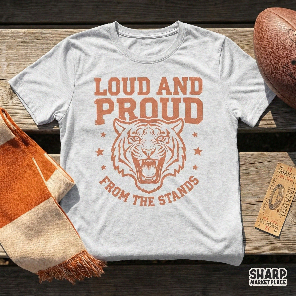 Distressed coral orange tiger mascot illustration featuring a roaring feline and collegiate style text for custom t-shirt and sublimation projects.