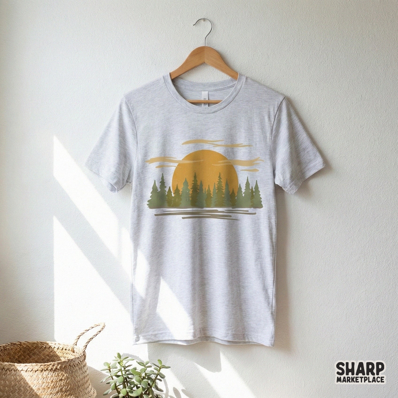 Nature-themed sunset forest graphic with earthy tones and horizontal line accents, suitable for printing on tumblers, apparel, or custom outdoor gear.