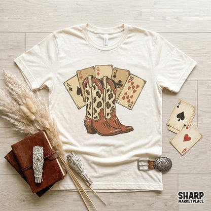Digital sublimation graphic of rustic cowgirl boots and playing cards, designed for custom tumblers, stickers, and trendy western themed clothing.