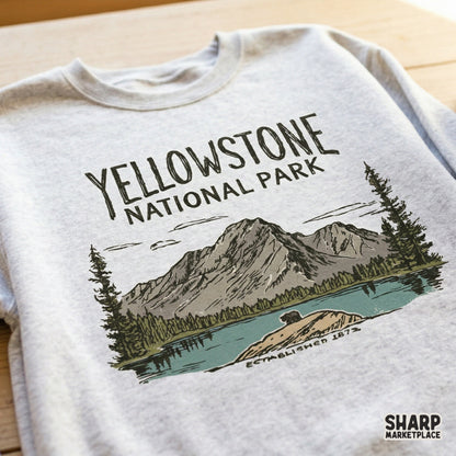 Detailed nature scene graphic with a bear, lake, and mountain range, ideal for sublimation printing on apparel or creating nostalgic outdoor gifts.
