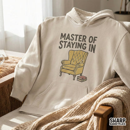 Vintage style illustration of a reading chair and books with the quote Master Of Staying In, designed for high-quality sublimation and apparel printing.