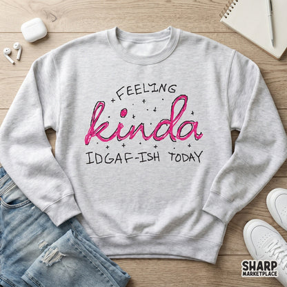 Retro-inspired digital graphic with the phrase Feeling Kinda IDGAF-Ish Today in pink script, ideal for sassy t-shirts and DIY print projects.
