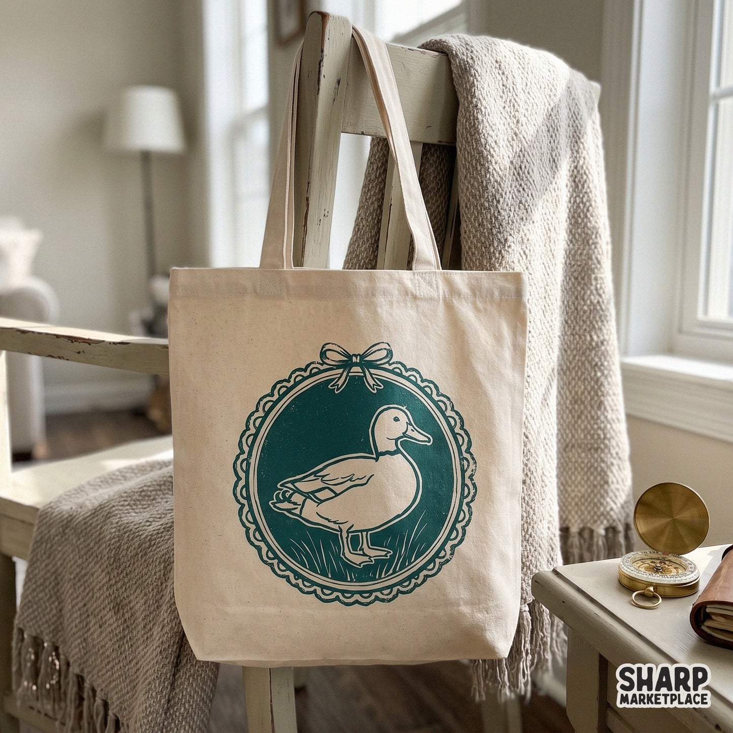 Teal mallard duck inside a decorative lace frame with a ribbon bow, styled as a distressed linocut print for sublimation and DIY craft projects.