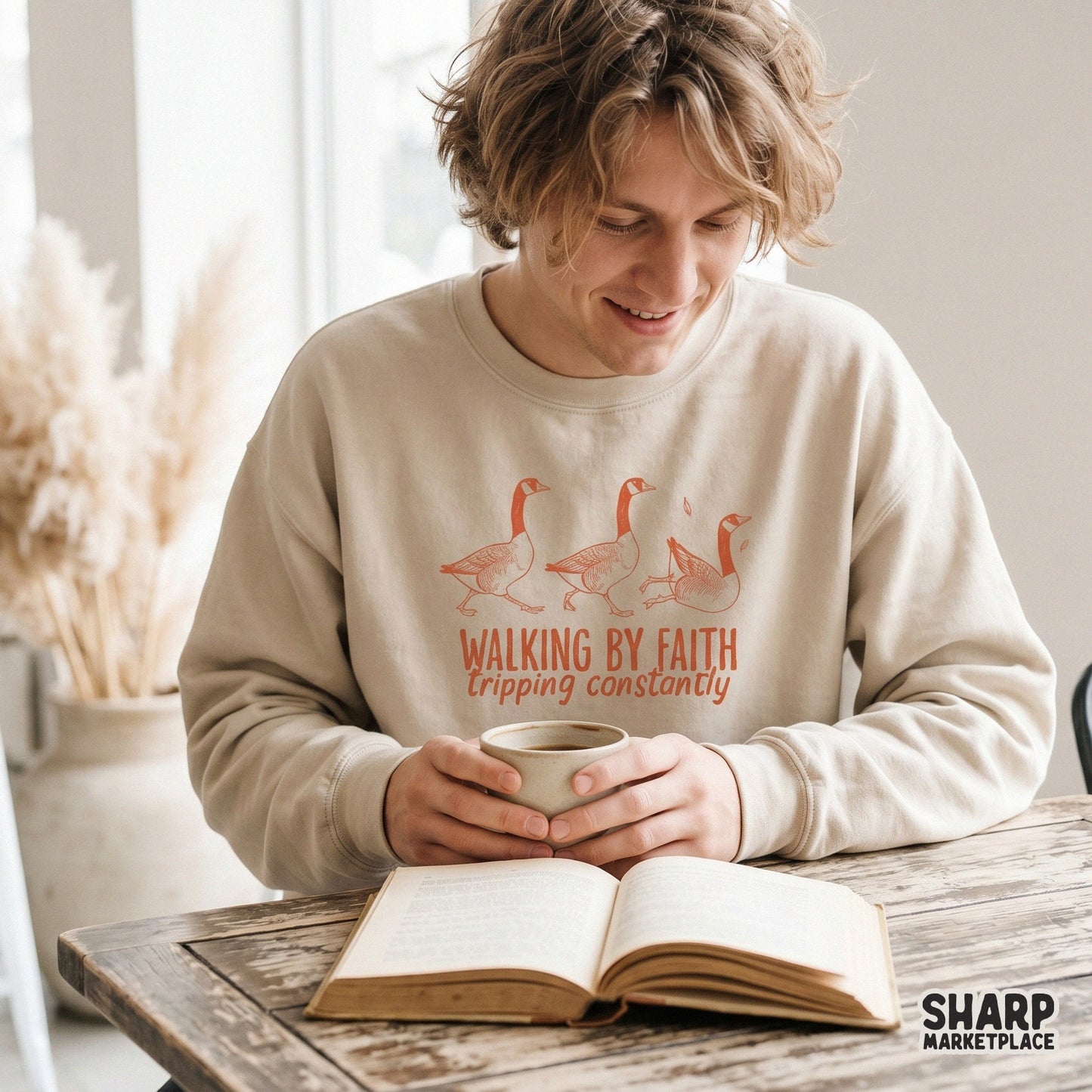 Funny Christian sublimation design featuring a whimsical goose trio and the text Walking By Faith Tripping Constantly in a bold orange font.