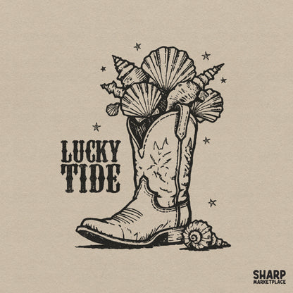 Black ink illustration of a western cowboy boot filled with seashells and starfish with the text Lucky Tide, perfect for summer apparel.