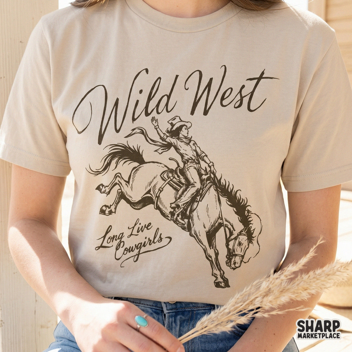 Detailed western bronc rider design with a distressed aesthetic, suitable for direct-to-garment printing or sublimation on light colored fabrics.