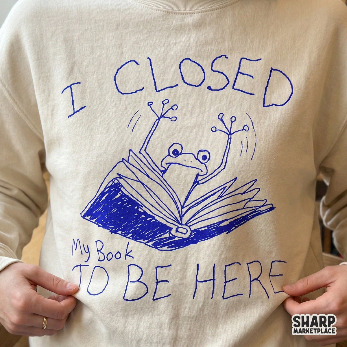 Funny introvert reader graphic with a frog jumping out of a book, ideal for sublimation transfers on apparel, tumblers, or DIY library gifts.