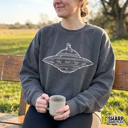Astronaut chilling on top of a flying saucer UFO trendy png sublimation art print for y2k space shirts