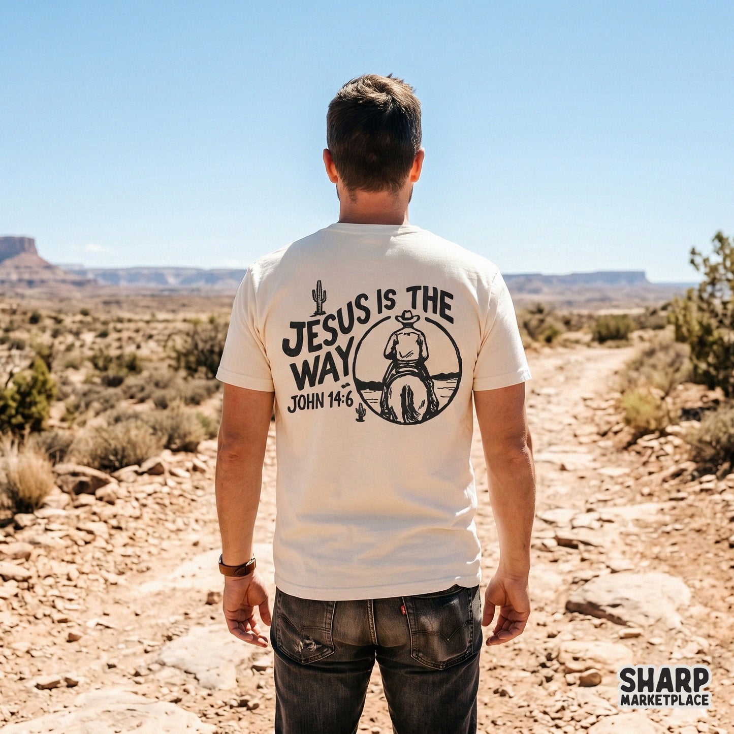 Western style Christian shirt graphic showing a cowboy riding toward a desert horizon with cactus accents and bold arched typography.