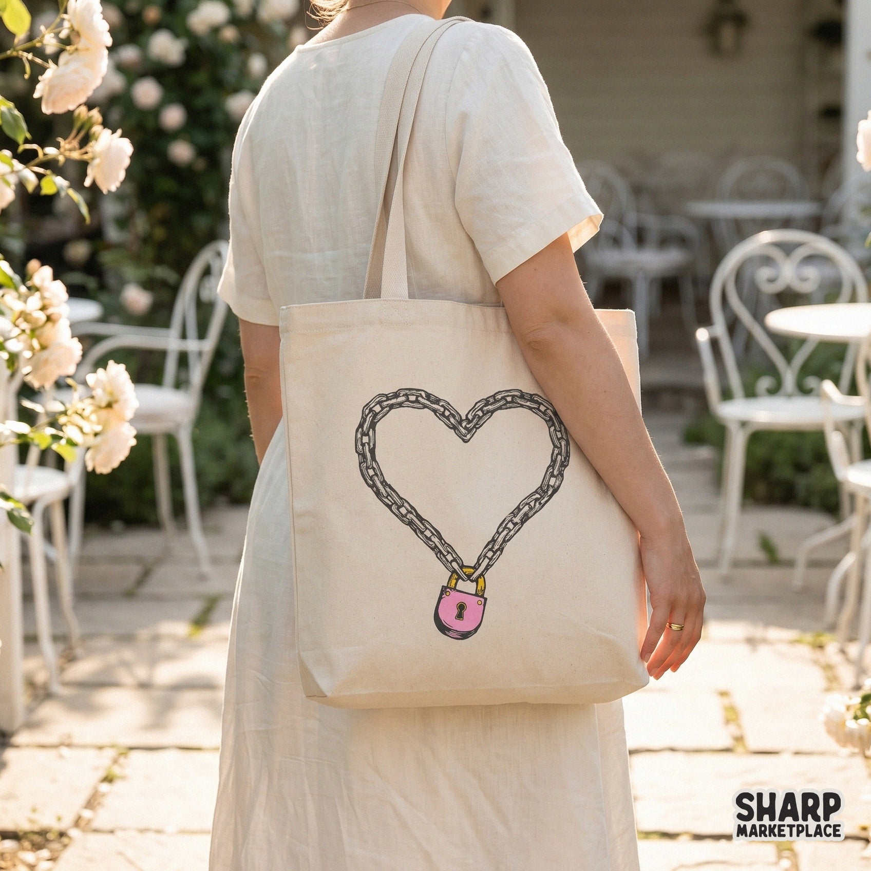 Detailed industrial chain heart with a pink padlock, a gothic romance digital graphic for custom Valentine t-shirts and stickers.
