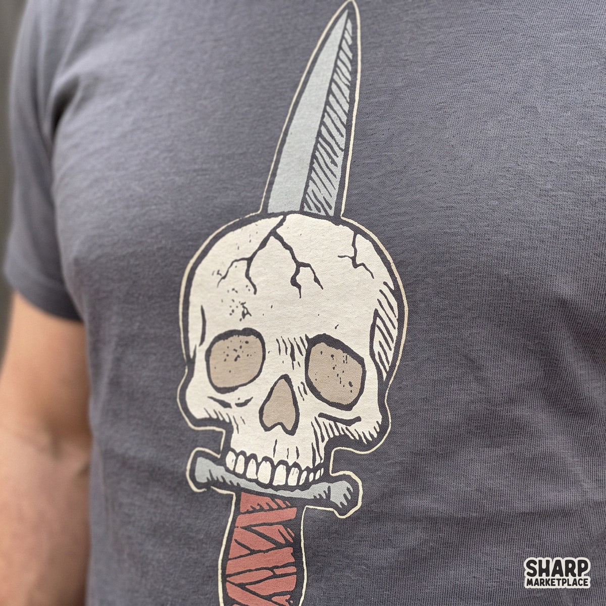 Traditional tattoo style dagger piercing a skull retro PNG for Halloween shirt designs and spooky sublimation