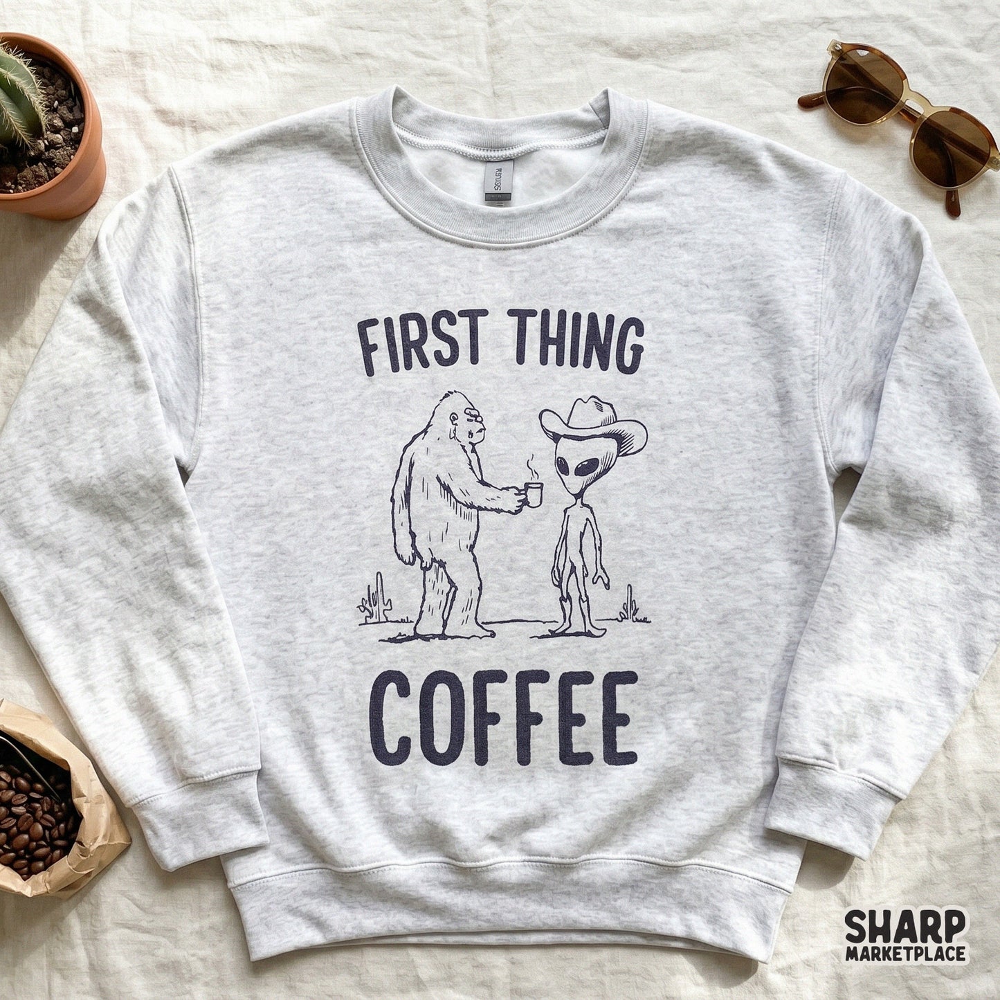 Digital design file featuring a humorous scene of a forest creature and a space visitor in western gear, perfect for coffee-themed sublimation projects.