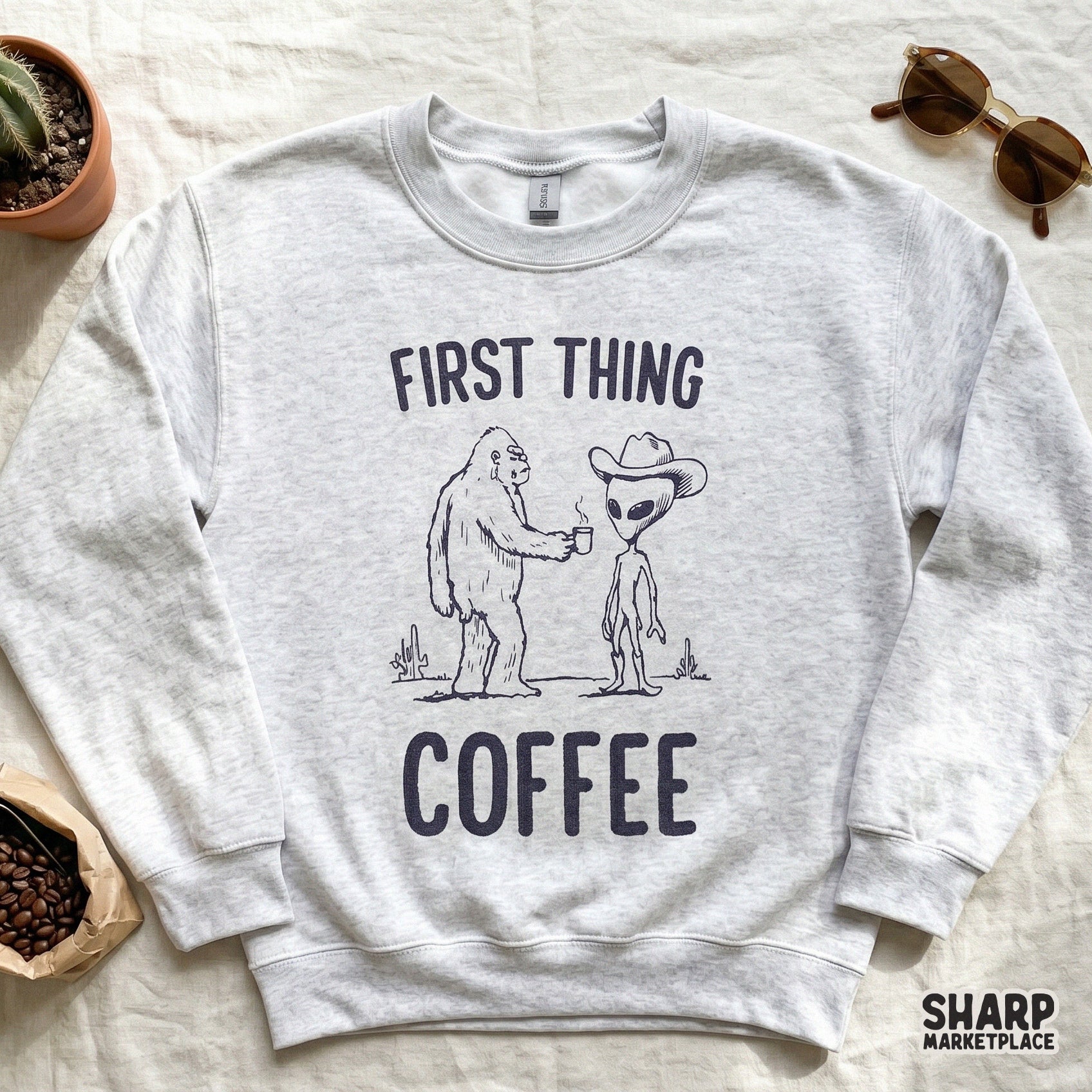 Digital design file featuring a humorous scene of a forest creature and a space visitor in western gear, perfect for coffee-themed sublimation projects.