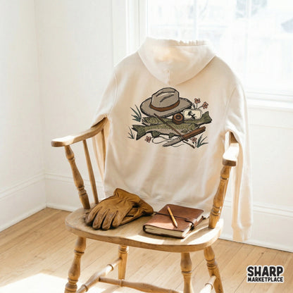 Trendy outdoor angler graphic with trout and fly fishing equipment, ideal for creating vintage-inspired t-shirts, stickers, or mountain cabin wall art.