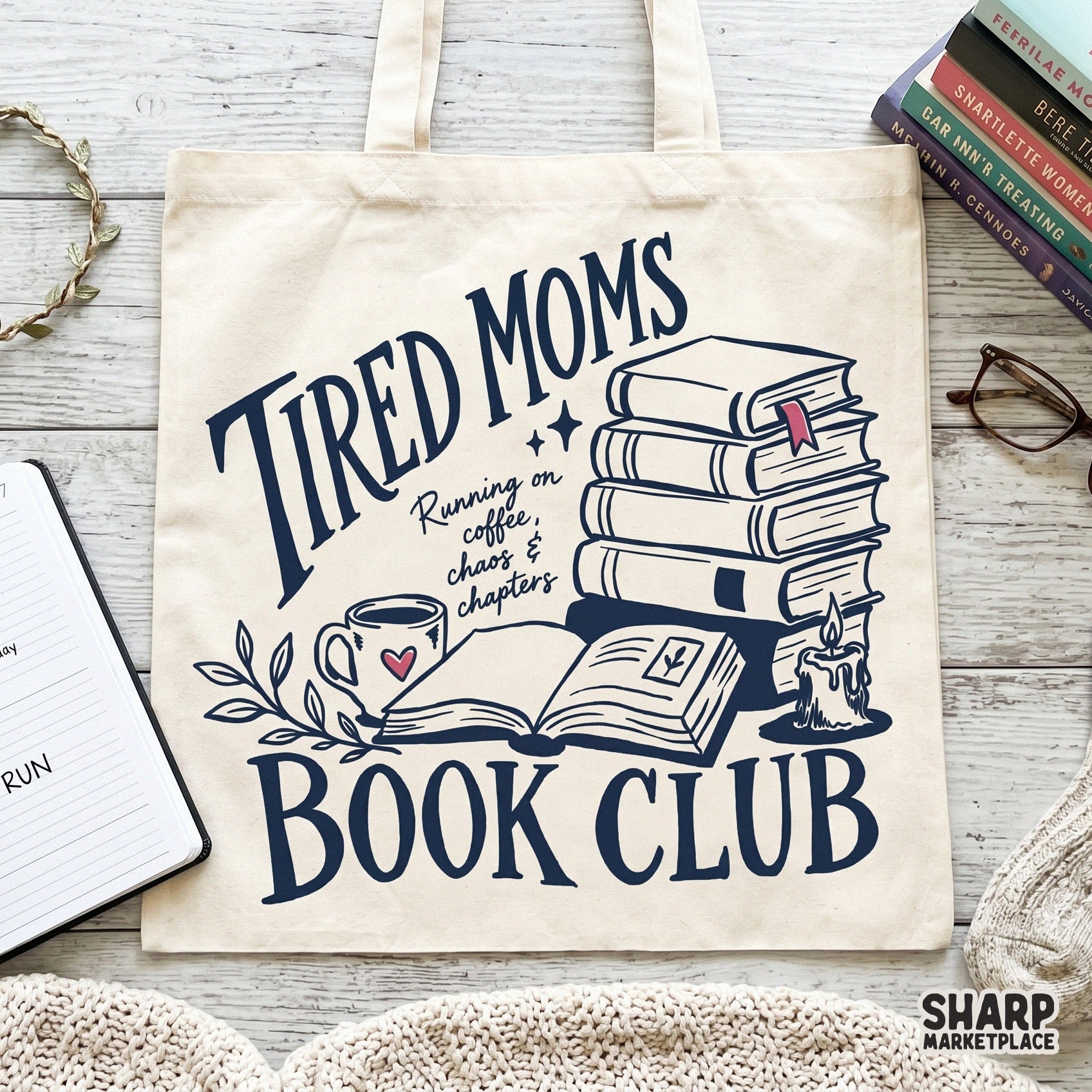 Whimsical bookish illustration in navy blue with pink accents featuring a stack of books and coffee, designed for DIY projects like stickers, tumblers, or