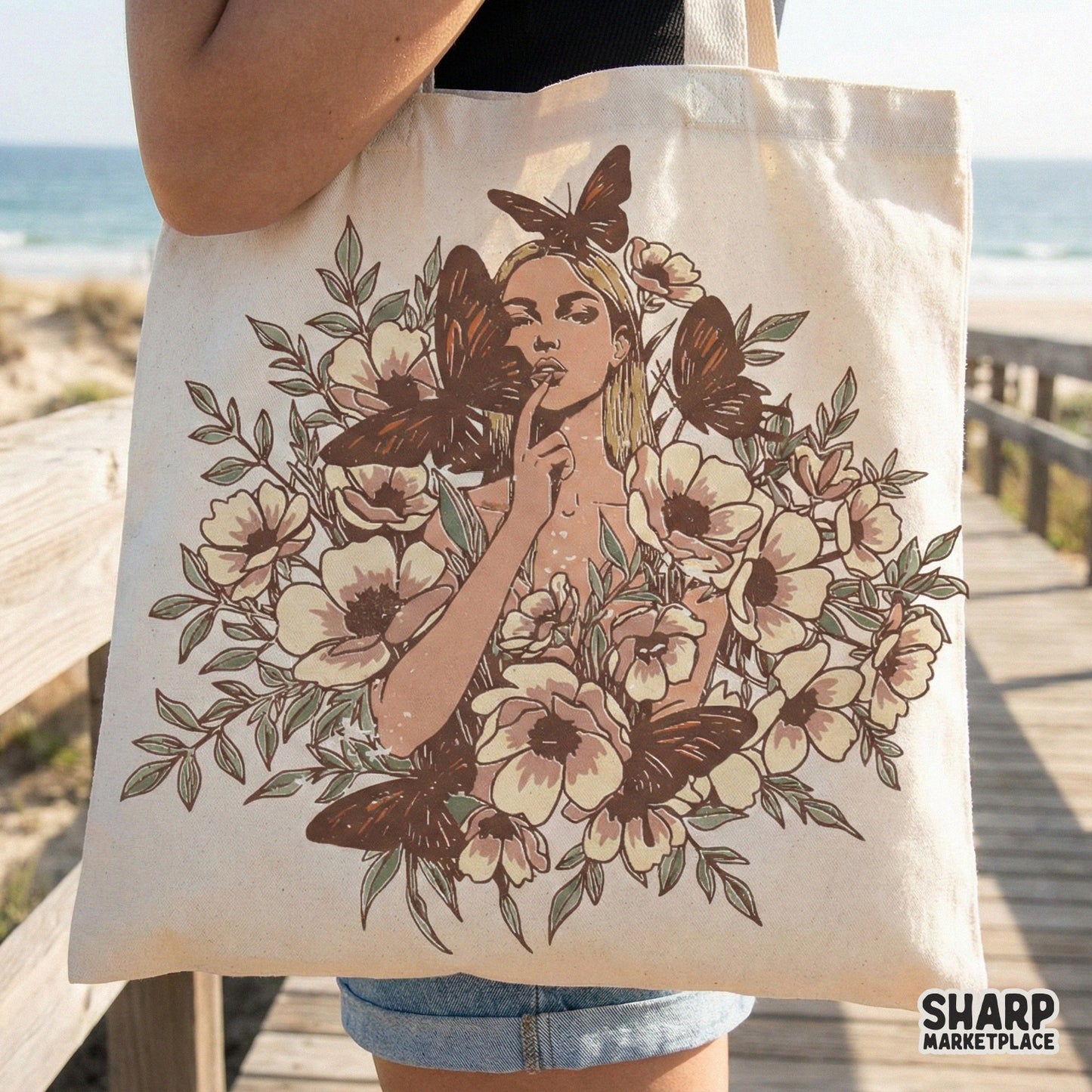 Hand-drawn botanical woman graphic with butterflies and flowers, perfect for custom tote bag designs, t-shirts, and artistic DIY projects.