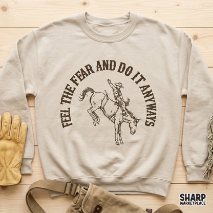 Rustic cowboy graphic with a bucking horse illustration and the text Feel The Fear And Do It Anyways, perfect for western-themed DIY projects.
