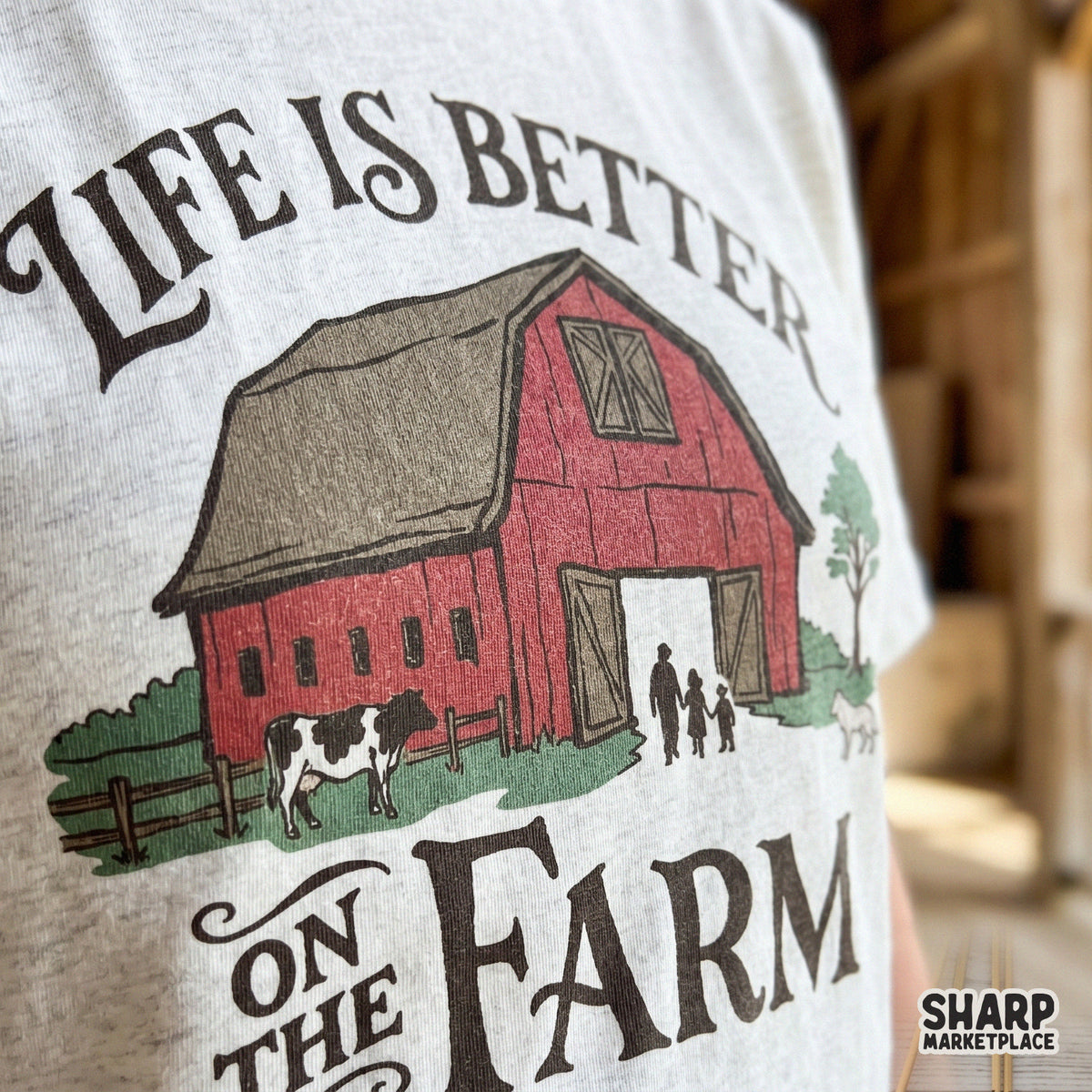 Digital sublimation graphic of a country farm scene with a red barn, cow, and family, perfect for custom fall t-shirts, stickers, and rustic home decor.