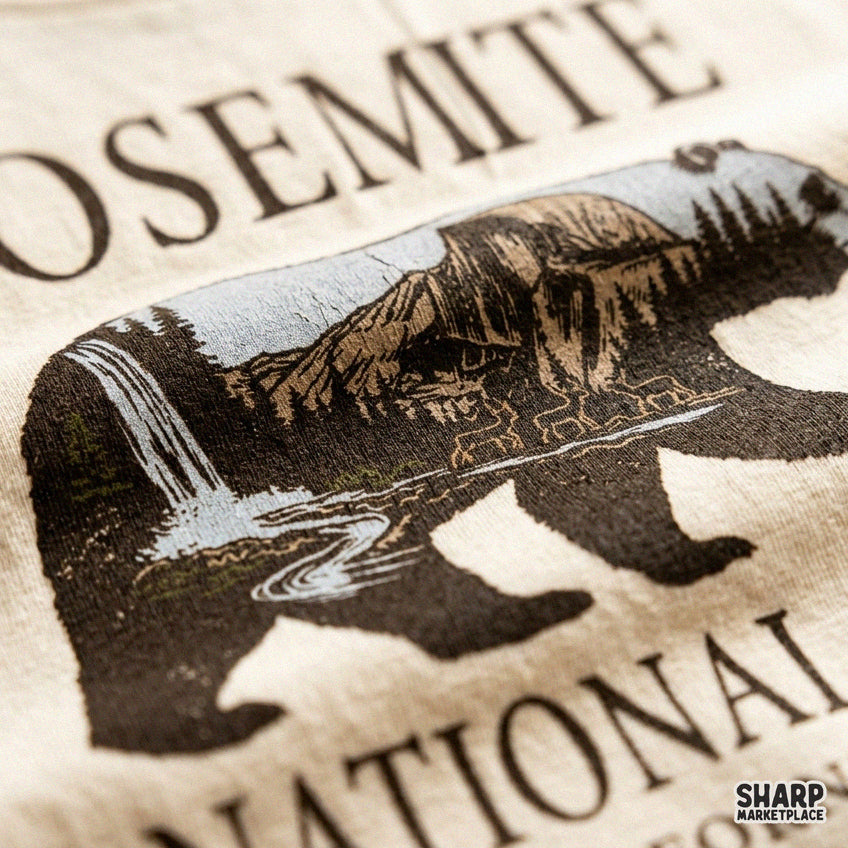 Retro Yosemite National Park bear silhouette PNG graphic with mountains and waterfall for t-shirts and nature lovers