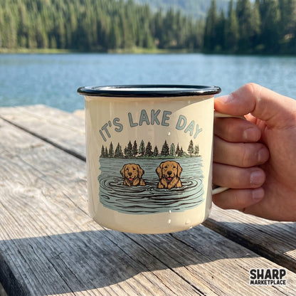 Sublimation ready PNG design of two happy golden retrievers in a lake with a forest background and vintage typography perfect for custom summer shirts.