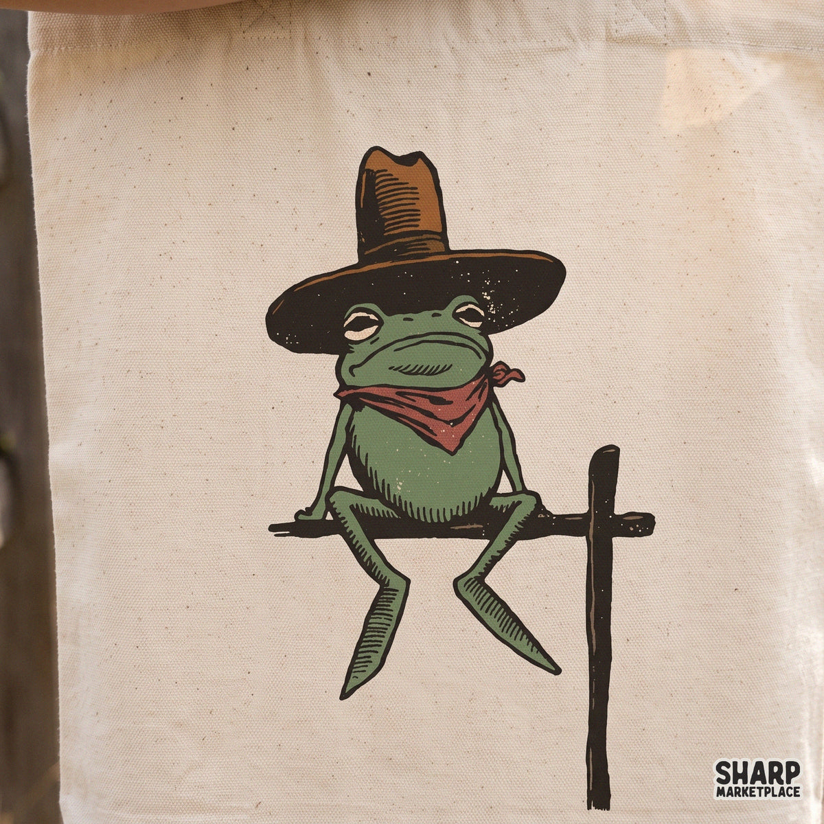 Funny rodeo frog in a cowboy hat and red bandana retro western PNG design for t-shirts and apparel