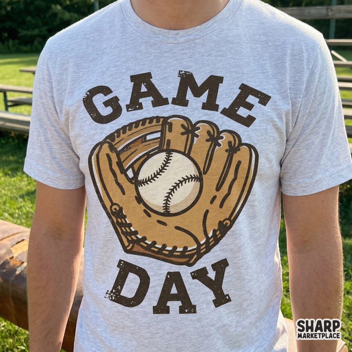 Distressed Game Day baseball graphic printed on a heather gray t-shirt, showcasing a vintage glove and ball illustration for custom sports clothing.