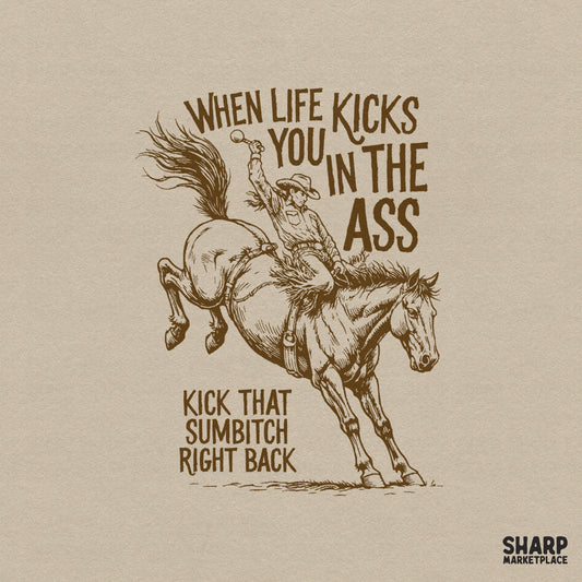 Retro brown illustration of a cowboy on a bucking bronco with the quote When Life Kicks You In The Ass Kick That Sumbitch Right Back for apparel.