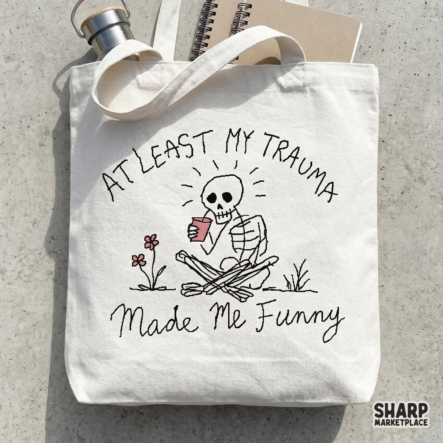 Whimsical skeleton illustration with flowers and the text At Least My Trauma Made Me Funny, perfect for sublimation, stickers, or custom tumblers.