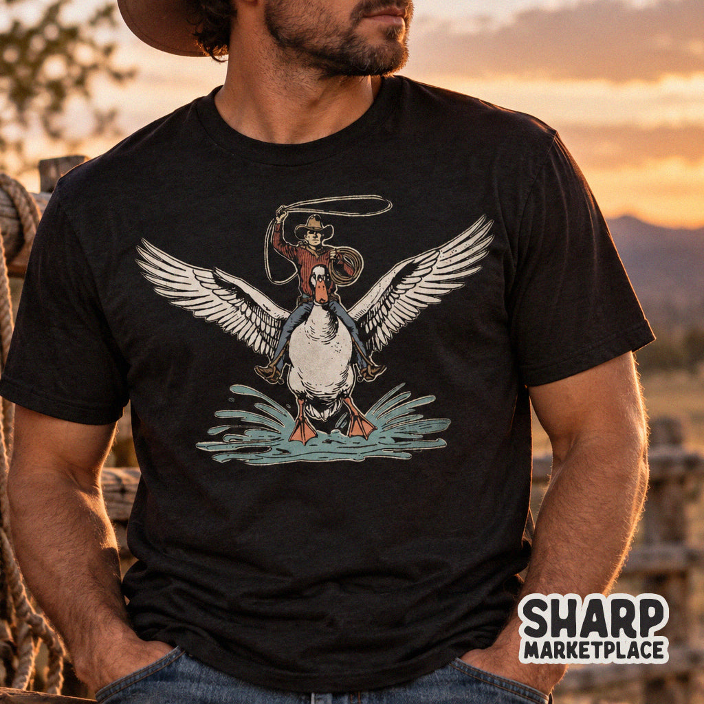 Surreal western cowboy riding a giant flying duck funny animal meme PNG design for t-shirts and sublimation prints