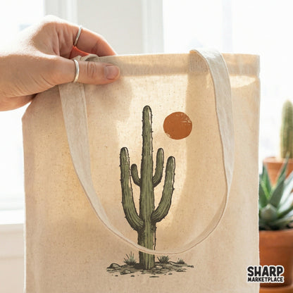 Rustic saguaro cactus and desert sun design printed on a canvas tote bag, showcasing a minimalist western style for apparel and DIY projects.