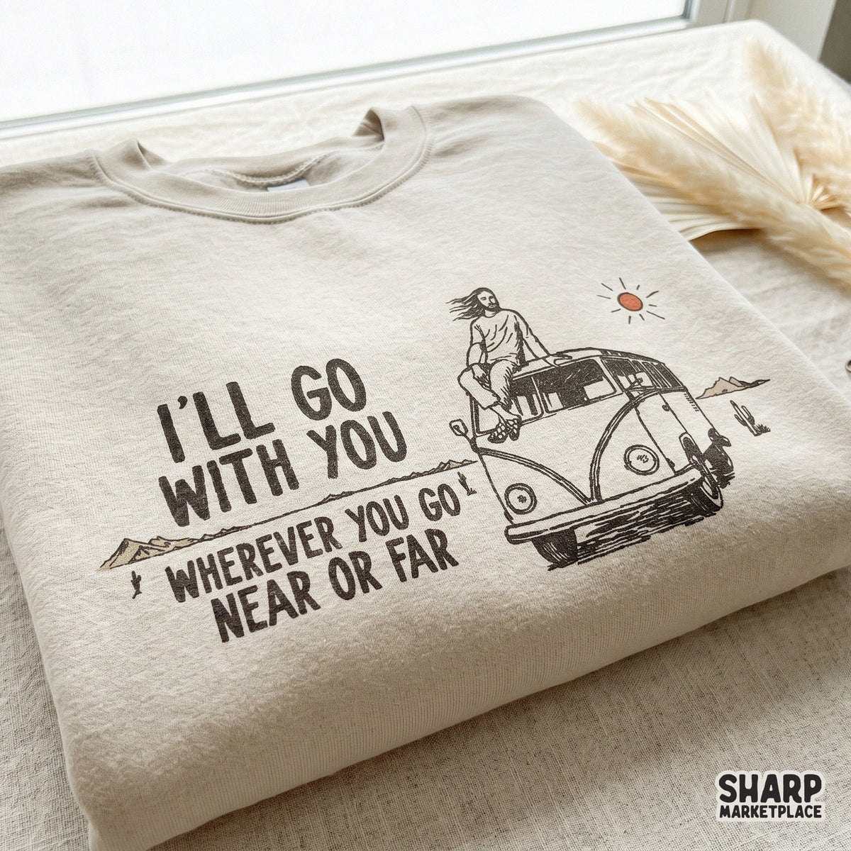 Sublimation design featuring a hand-drawn camper van and inspirational text in earth tones, perfect for custom t-shirts, mugs, and travel decor.