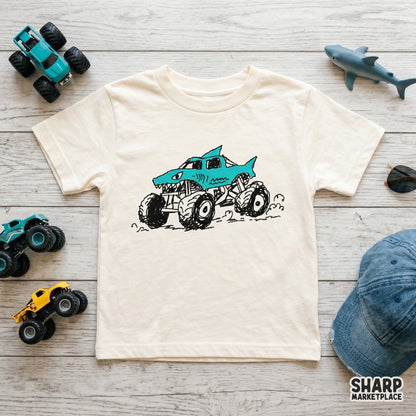 Doodle-style shark vehicle graphic with a dorsal fin and big wheels, ideal for creating custom stickers, posters, or fun boys t-shirt designs.