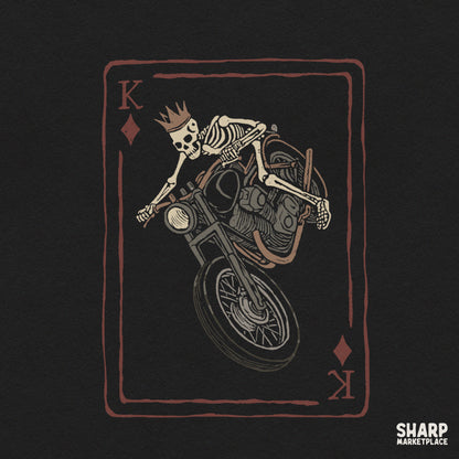 Retro king of diamonds skeleton biker riding a motorcycle wheelie PNG graphic for Halloween t-shirt sublimation designs