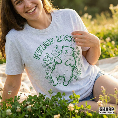 Whimsical bear and clover illustration in monochromatic green, perfect for DIY St. Patrick's Day shirts, stickers, or custom spring-themed sublimation.