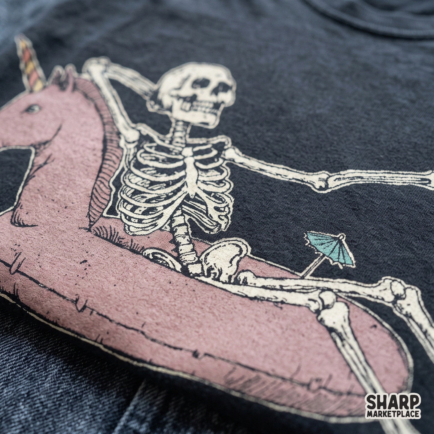 Relaxing skeleton in a pink unicorn floatie for summer goth pool vibes, retro spooky season vacation PNG sublimation art