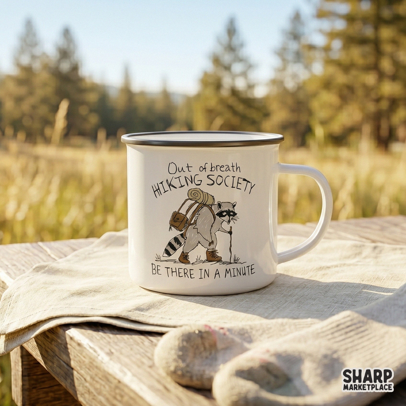 Digital sublimation design featuring a whimsical sketch of a raccoon hiker with a backpack, perfect for custom camping t-shirts and outdoor-themed apparel.