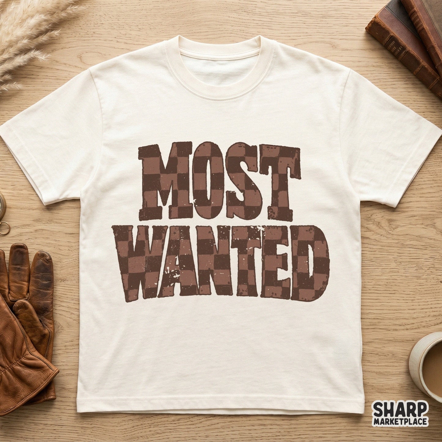 Vintage style Most Wanted graphic with a brown checkered fill and weathered edges, ideal for rustic sublimation transfers and apparel.