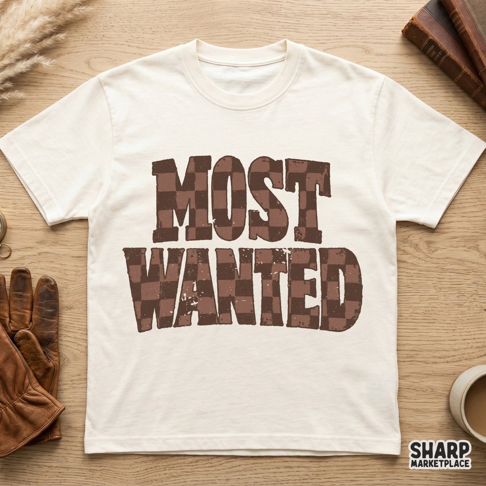Vintage style Most Wanted graphic with a brown checkered fill and weathered edges, ideal for rustic sublimation transfers and apparel.